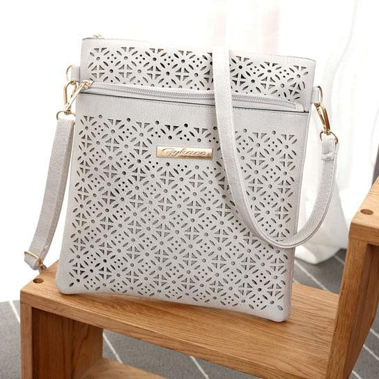 Blossomita Handbag With Cutout Flower Design - SHOPSOLONY
